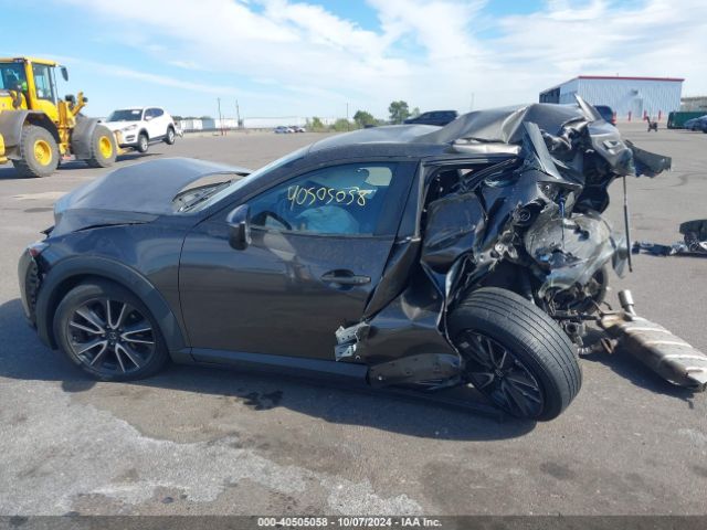 JM1DKFC74J0309074 Mazda Cx-3 Touring