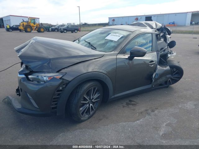 JM1DKFC74J0309074 Mazda Cx-3 Touring
