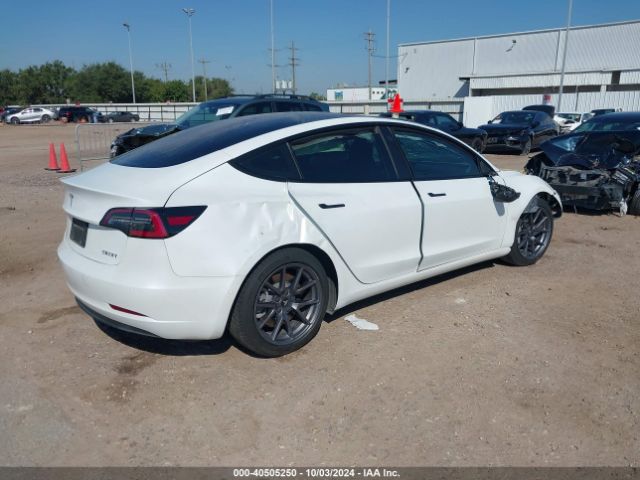5YJ3E1EA6MF907879 Tesla Model 3 Standard Range Plus Rear-wheel Drive