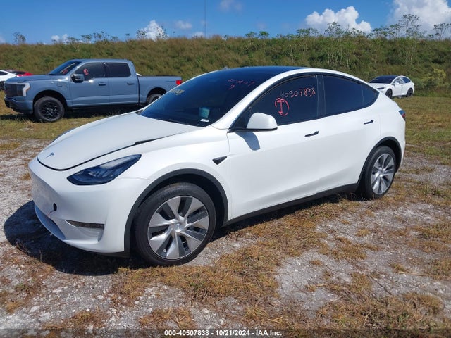 2023 TESLA MODEL Y 7SAYGDEE5PF618102 Photo 1