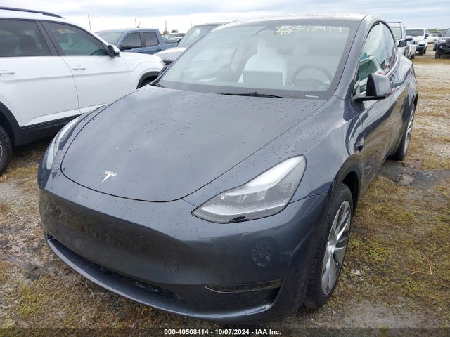 2023 TESLA MODEL Y 7SAYGDEE9PA180410 Photo 1