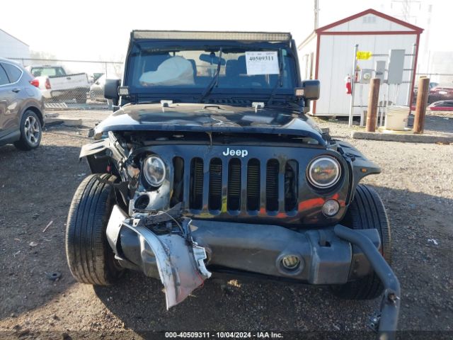 1C4AJWAG3GL334497 Jeep Wrangler Sport