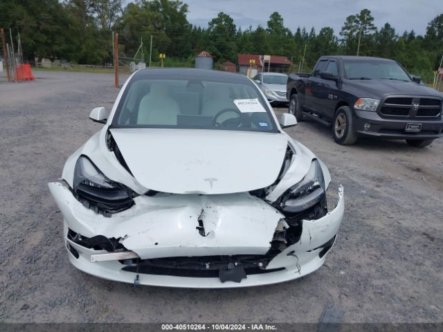 5YJ3E1EA1MF853715 Tesla Model 3 Standard Range Plus Rear-wheel Drive