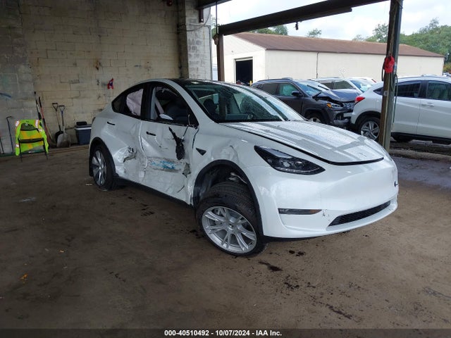 2024 TESLA MODEL Y 7SAYGDEE7RA288673 Photo 0