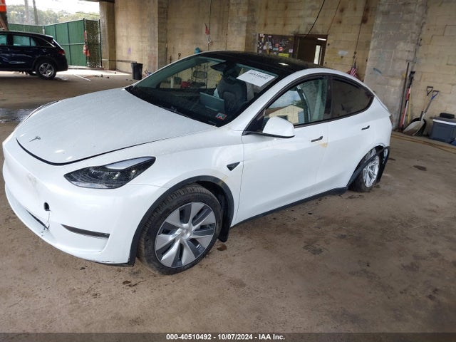 2024 TESLA MODEL Y 7SAYGDEE7RA288673 Photo 1