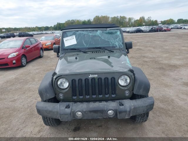 1C4BJWDGXFL658593 Jeep Wrangler Unlimited Sport