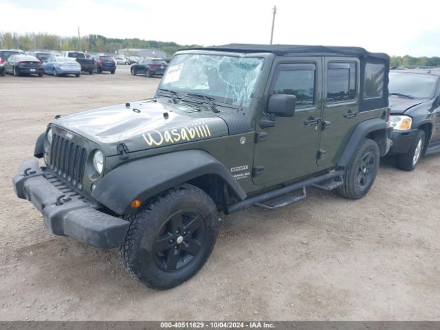 1C4BJWDGXFL658593 Jeep Wrangler Unlimited Sport