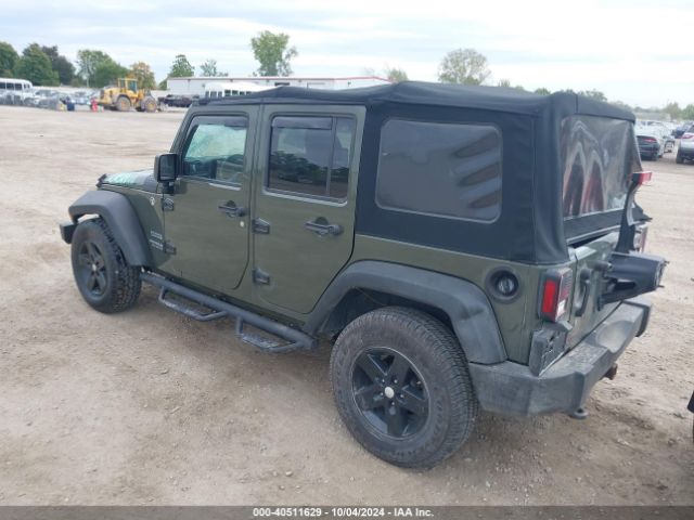 1C4BJWDGXFL658593 Jeep Wrangler Unlimited Sport