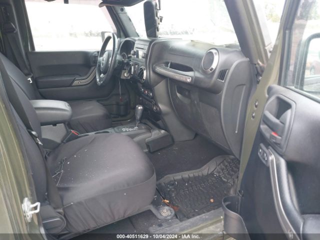 1C4BJWDGXFL658593 Jeep Wrangler Unlimited Sport