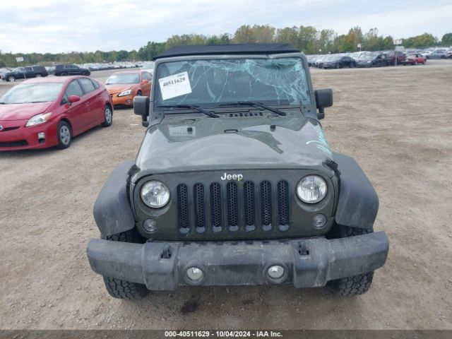 1C4BJWDGXFL658593 Jeep Wrangler Unlimited Sport