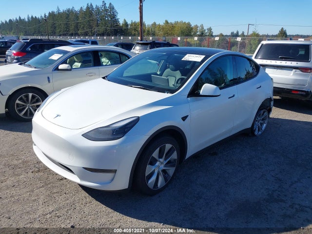 2023 TESLA MODEL Y 7SAYGDEE6PF807244 Photo 1