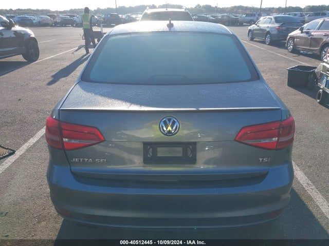 3VWD17AJ0GM395669 Volkswagen Jetta 1.8t Sport