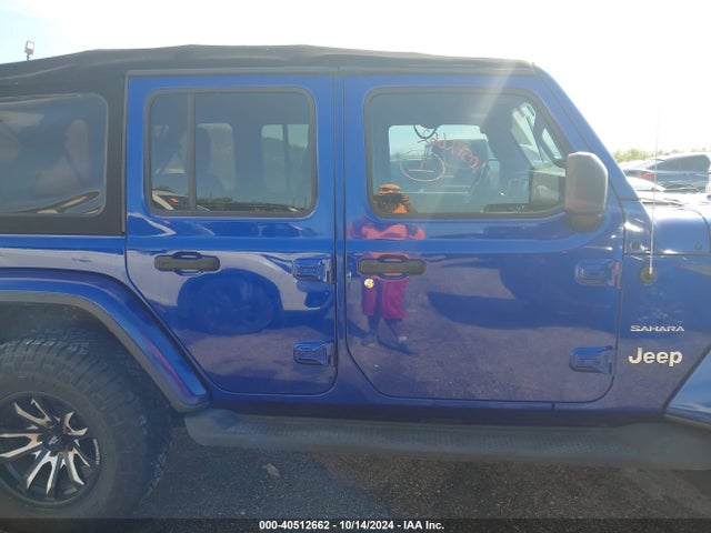 1C4HJXEN3JW211737 Jeep Wrangler Unlimited Sahara 4x4