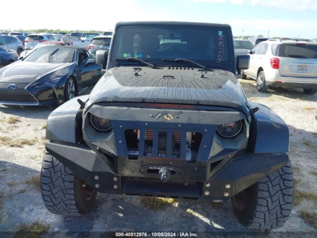 1C4BJWEG0GL264486 Jeep Wrangler Unlimited Sahara