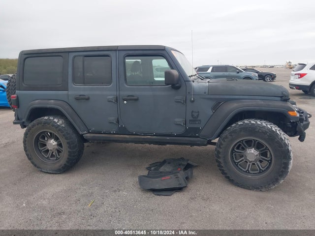1C4HJXEG1JW140698 Jeep Wrangler Unlimited Sahara 4x4