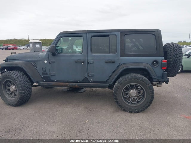 1C4HJXEG1JW140698 Jeep Wrangler Unlimited Sahara 4x4