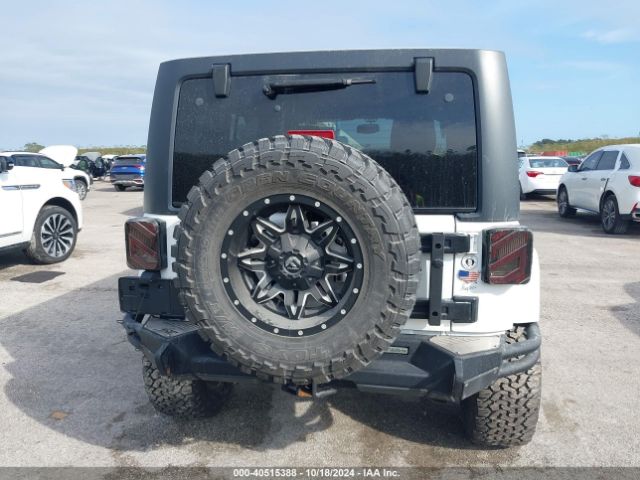 1C4HJWEG7JL819323 Jeep Wrangler Jk Unlimited Sahara