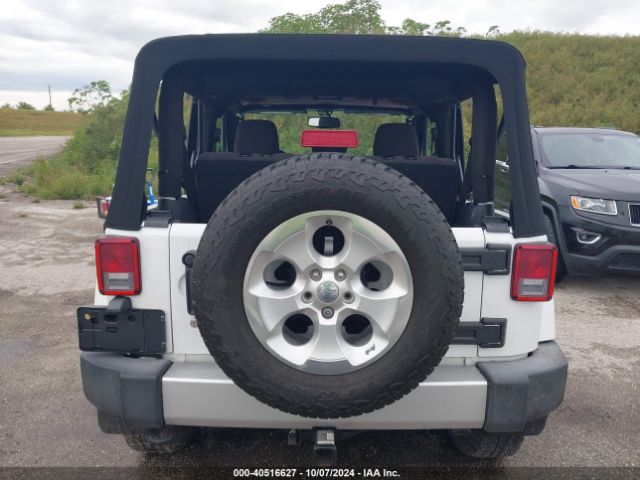 1C4AJWBG3EL214422 Jeep Wrangler Sahara