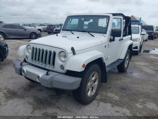 1C4AJWBG3EL214422 Jeep Wrangler Sahara