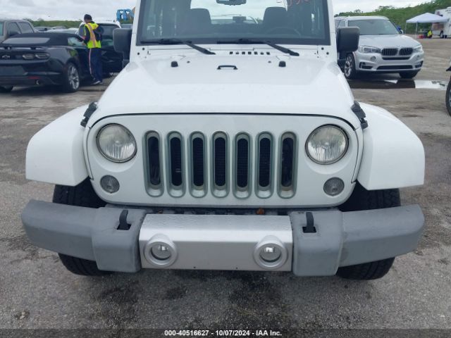 1C4AJWBG3EL214422 Jeep Wrangler Sahara