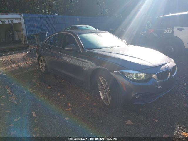 WBA4J5C54KBM66134 auction archive image