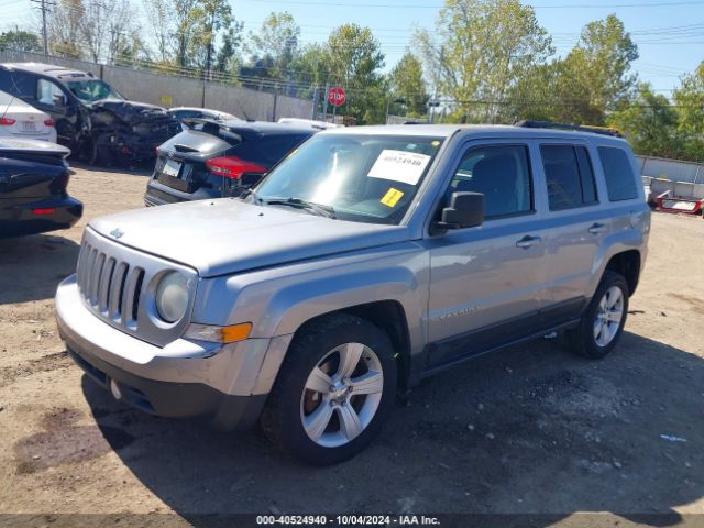 1C4NJRFB9ED793055 Jeep Patriot Latitude