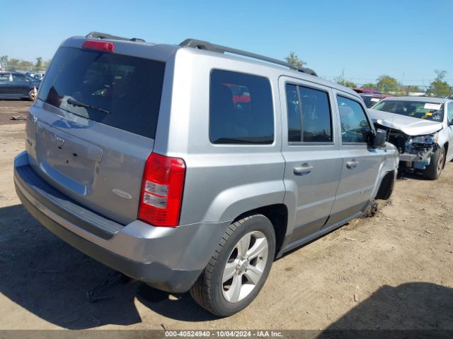 1C4NJRFB9ED793055 Jeep Patriot Latitude
