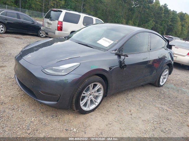 2023 TESLA MODEL Y 7SAYGDEE9PF663902 Photo 1