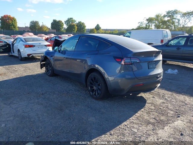 2023 TESLA MODEL Y 7SAYGDEEXPF766262 Photo 2