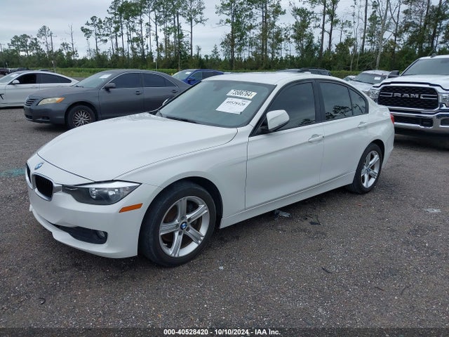 WBA3B1C5XEK133068 BMW 320i