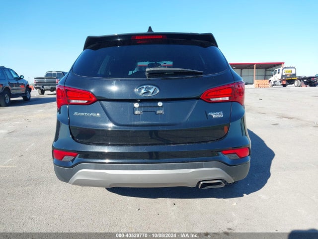 5NMZUDLB1HH050840 Hyundai Santa Fe Sport 2.4l