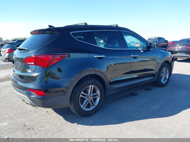 5NMZUDLB1HH050840 Hyundai Santa Fe Sport 2.4l