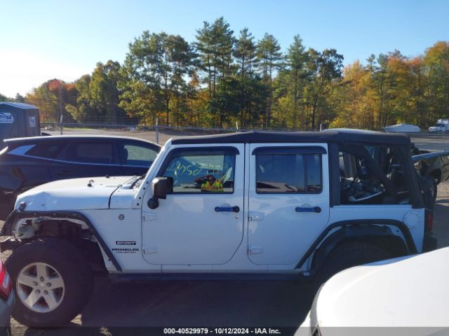 1C4BJWDG4GL303047 Jeep Wrangler Unlimited Sport