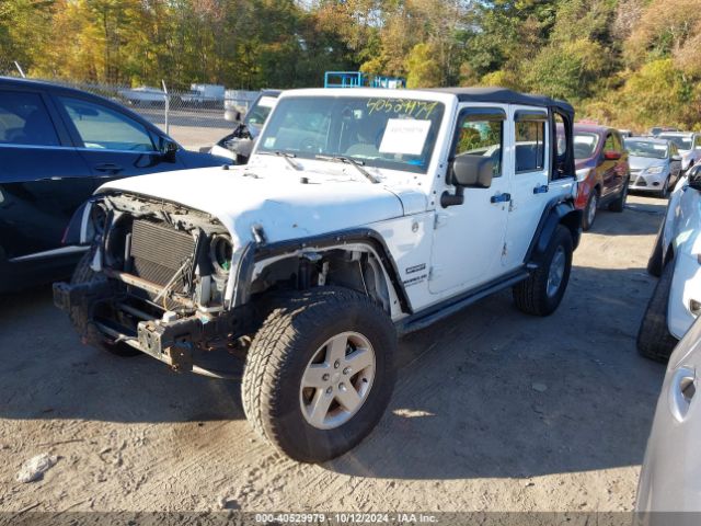 1C4BJWDG4GL303047 Jeep Wrangler Unlimited Sport