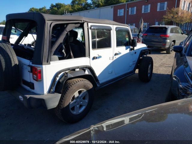 1C4BJWDG4GL303047 Jeep Wrangler Unlimited Sport