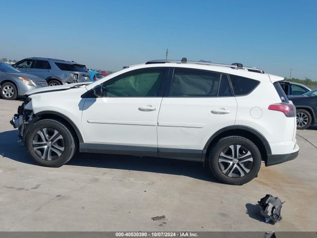 JTMZFREV0GJ094156 Toyota RAV4 LE
