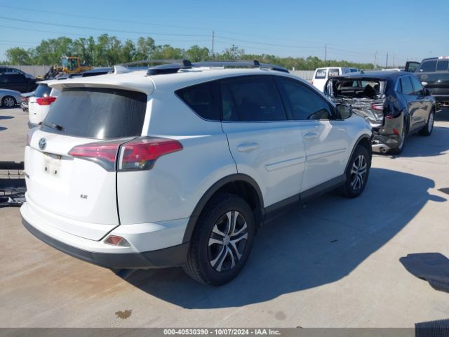 JTMZFREV0GJ094156 Toyota RAV4 LE