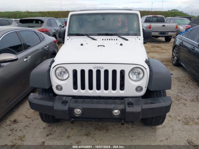 1C4AJWAG0GL339110 Jeep Wrangler Sport
