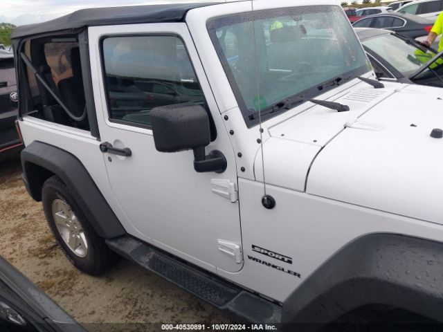 1C4AJWAG0GL339110 Jeep Wrangler Sport