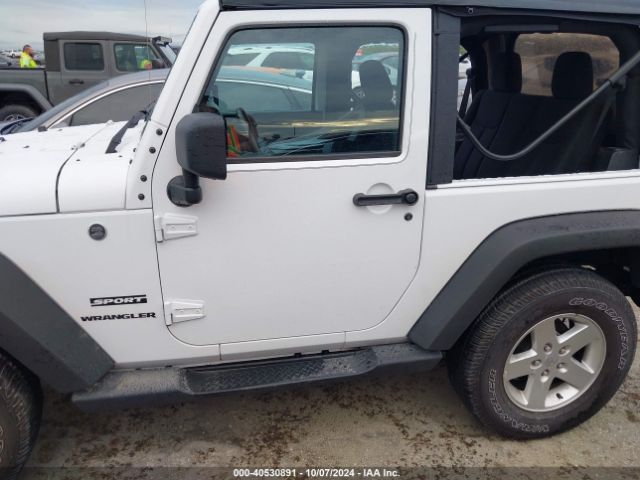 1C4AJWAG0GL339110 Jeep Wrangler Sport