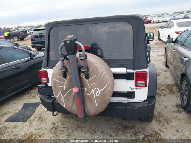 1C4AJWAG0GL339110 Jeep Wrangler Sport