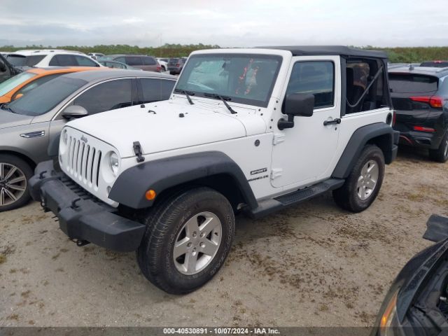 1C4AJWAG0GL339110 Jeep Wrangler Sport