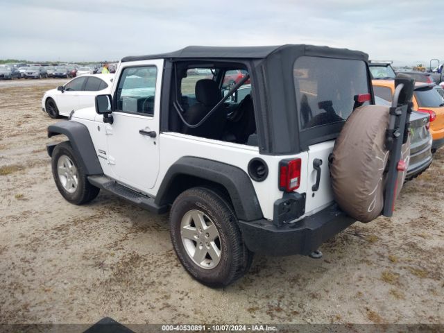 1C4AJWAG0GL339110 Jeep Wrangler Sport