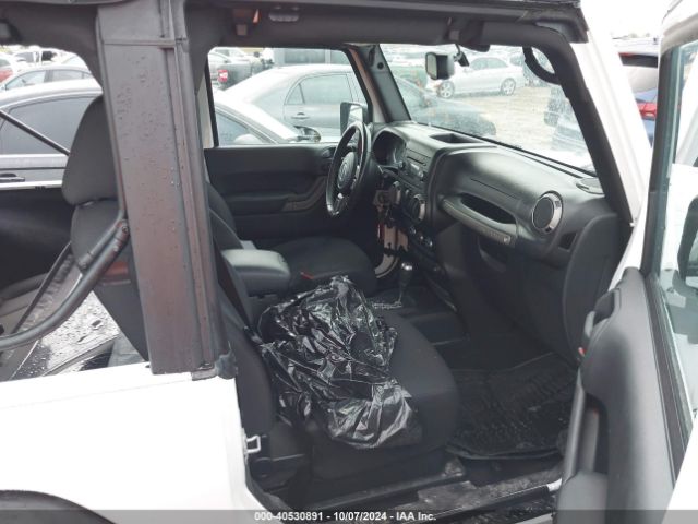 1C4AJWAG0GL339110 Jeep Wrangler Sport