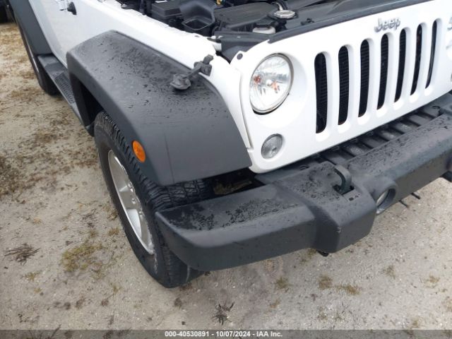 1C4AJWAG0GL339110 Jeep Wrangler Sport