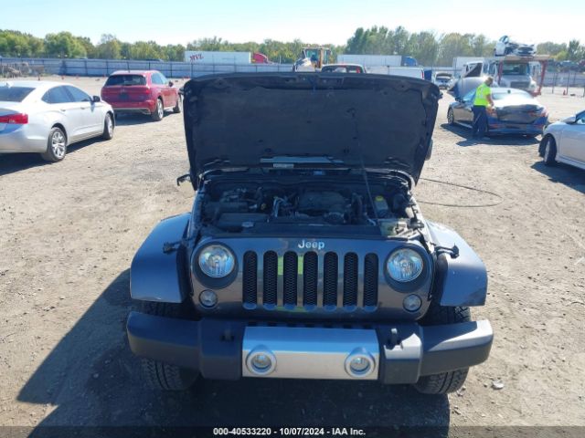 1C4AJWBG7EL229618 Jeep Wrangler Sahara