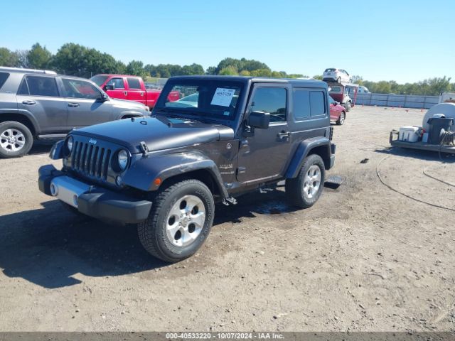 1C4AJWBG7EL229618 Jeep Wrangler Sahara