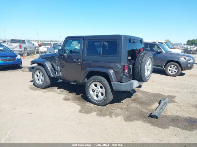 1C4AJWBG7EL229618 Jeep Wrangler Sahara