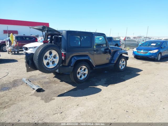 1C4AJWBG7EL229618 Jeep Wrangler Sahara