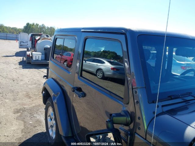 1C4AJWBG7EL229618 Jeep Wrangler Sahara